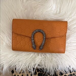 Tan Embossed Leather Clutch